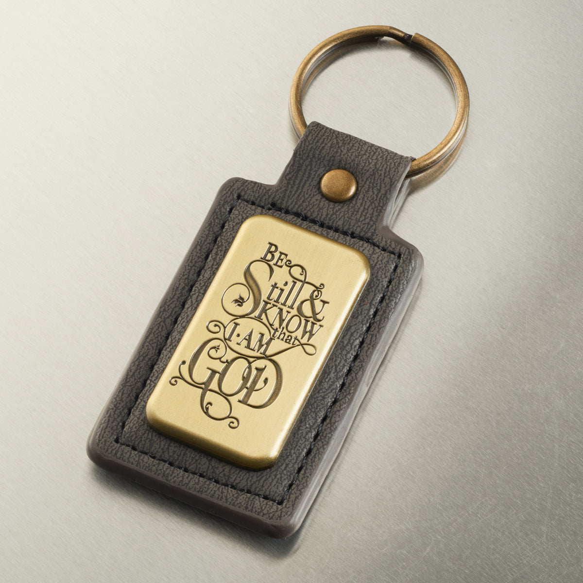Be Still and Know Grey Faux Leather Key Ring in Gift Tin – Psalm 46:10 - The Christian Gift Company