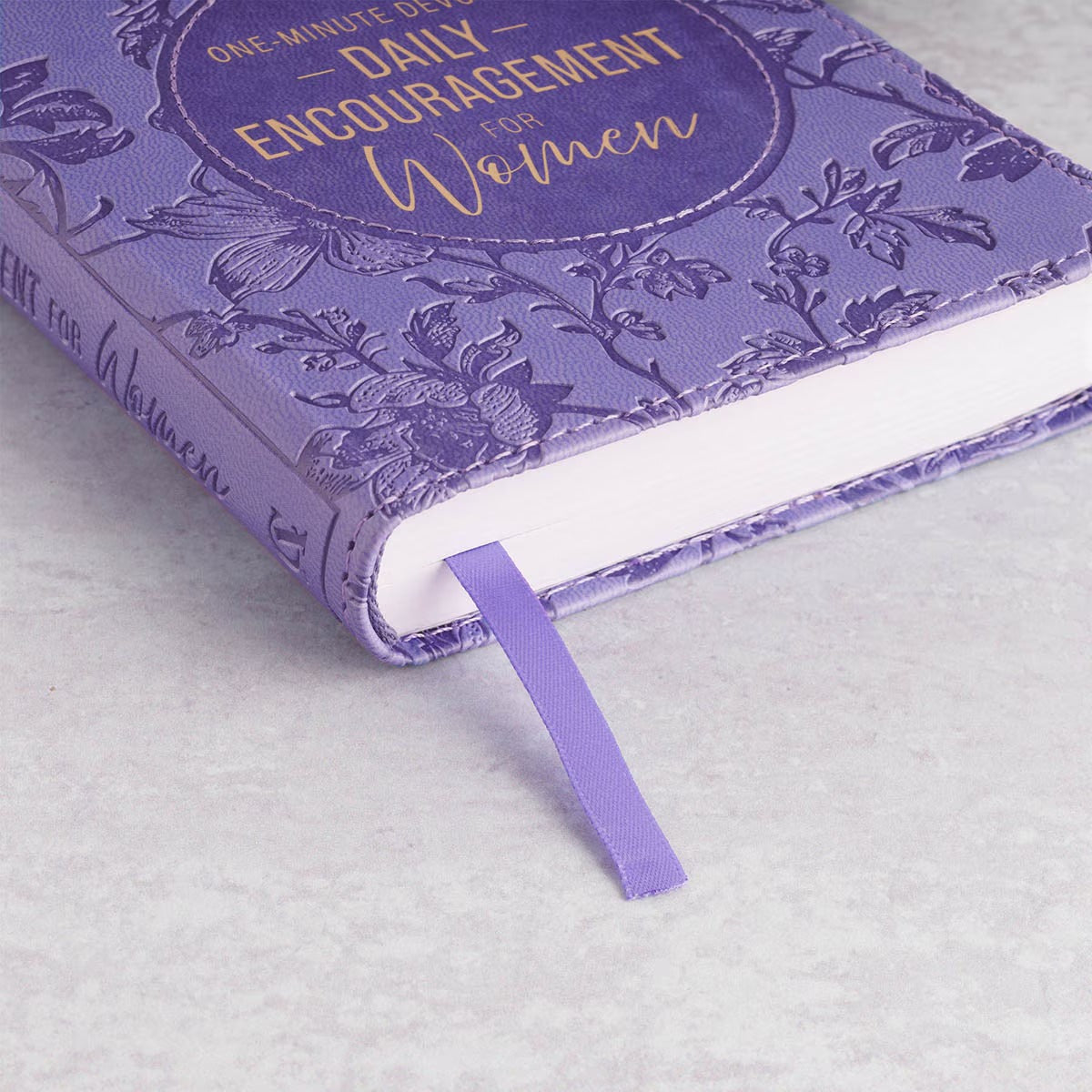 One-Minute Devotions®: Daily Encouragement for Women Purple Floral Faux Leather Devotional - The Christian Gift Company